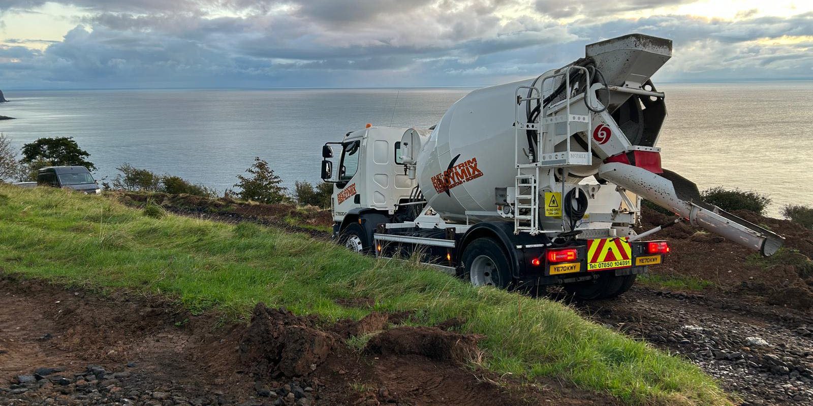 486506960_122144818010542419_7969392592308024375_n East Antrim Ready Mix Concrete truck at the coast